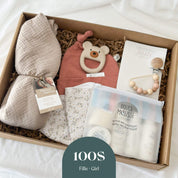 Boîte naissance fille 100 $ avec couverture mousseline, hochet ourson et soins bébé produits locaux
